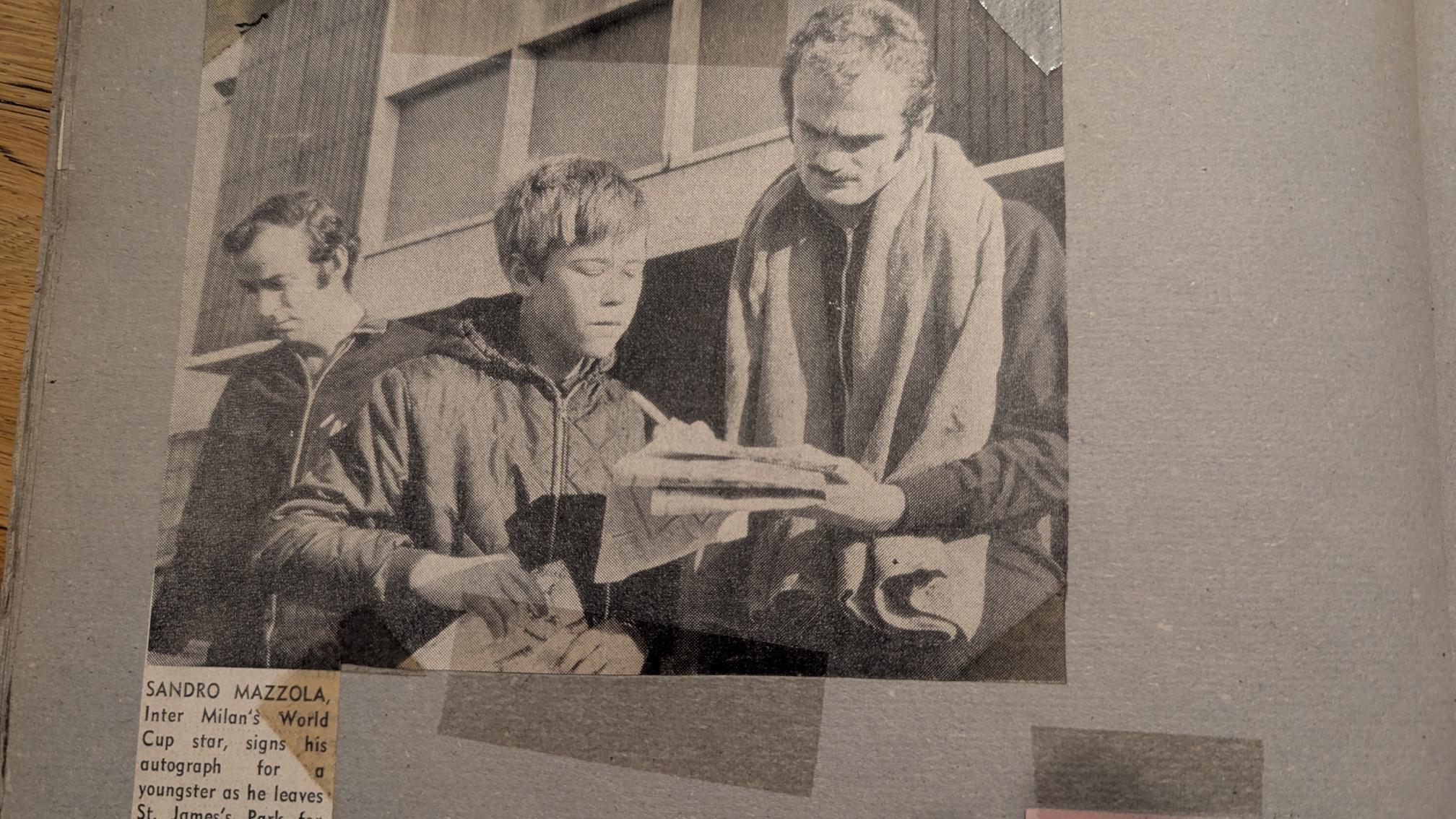 A young Newcastle fan gets Sandro Mazzola's autograph